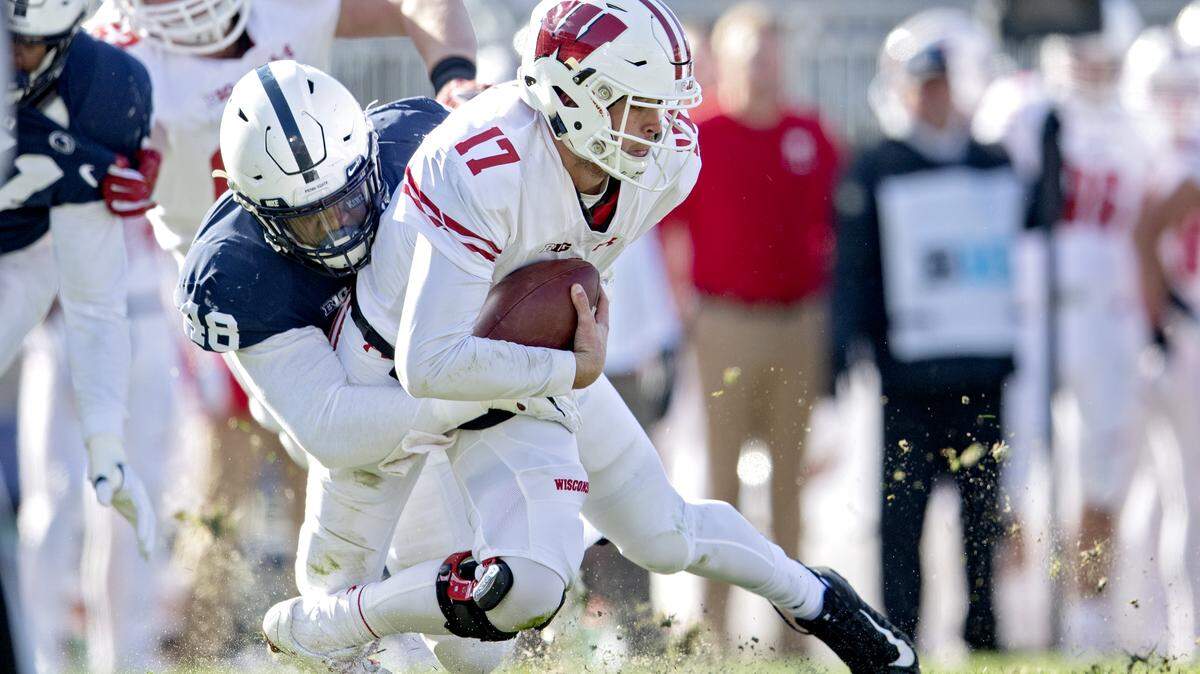 Penn State defensive end Shareef Miller sacks Wisconsin quarterback Jack Coan during the game on Saturday, Nov. 10, 2018.  