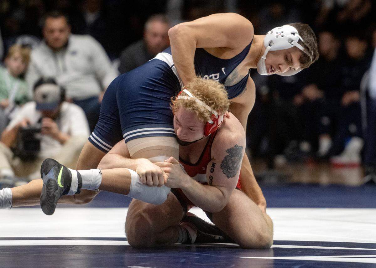 Penn State’s Alex Facundo wrestles Maryland’s Lucas Cordio in the 165 lb bout of the match on Sunday, Feb. 12, 2023 at Rec Hall.