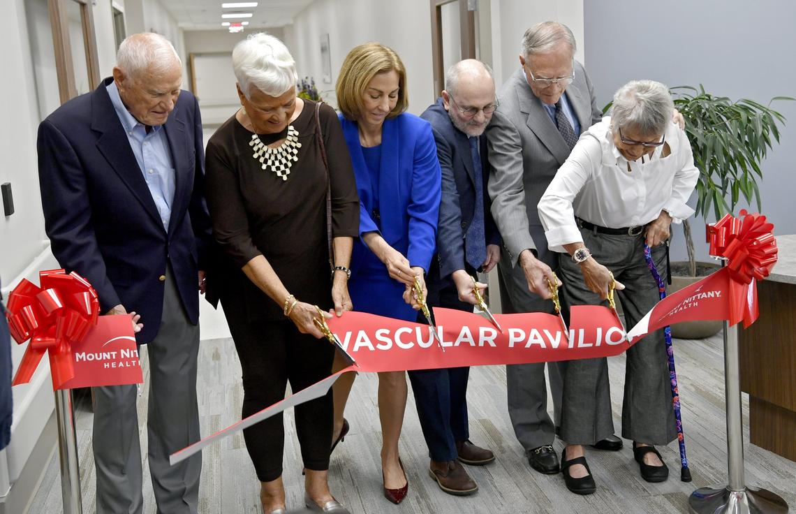 Donors Andrew and Marilyn Charney, Mount Nittany Health President and CEO Kathleen Rhine, cardiologist Albert Zoda, MD, FACC and donors Galen and Nancy Dreibelbis take part in the ribbon cutting for the new Cardiovascular Pavilion at Mount Nittany Health on Thursday.