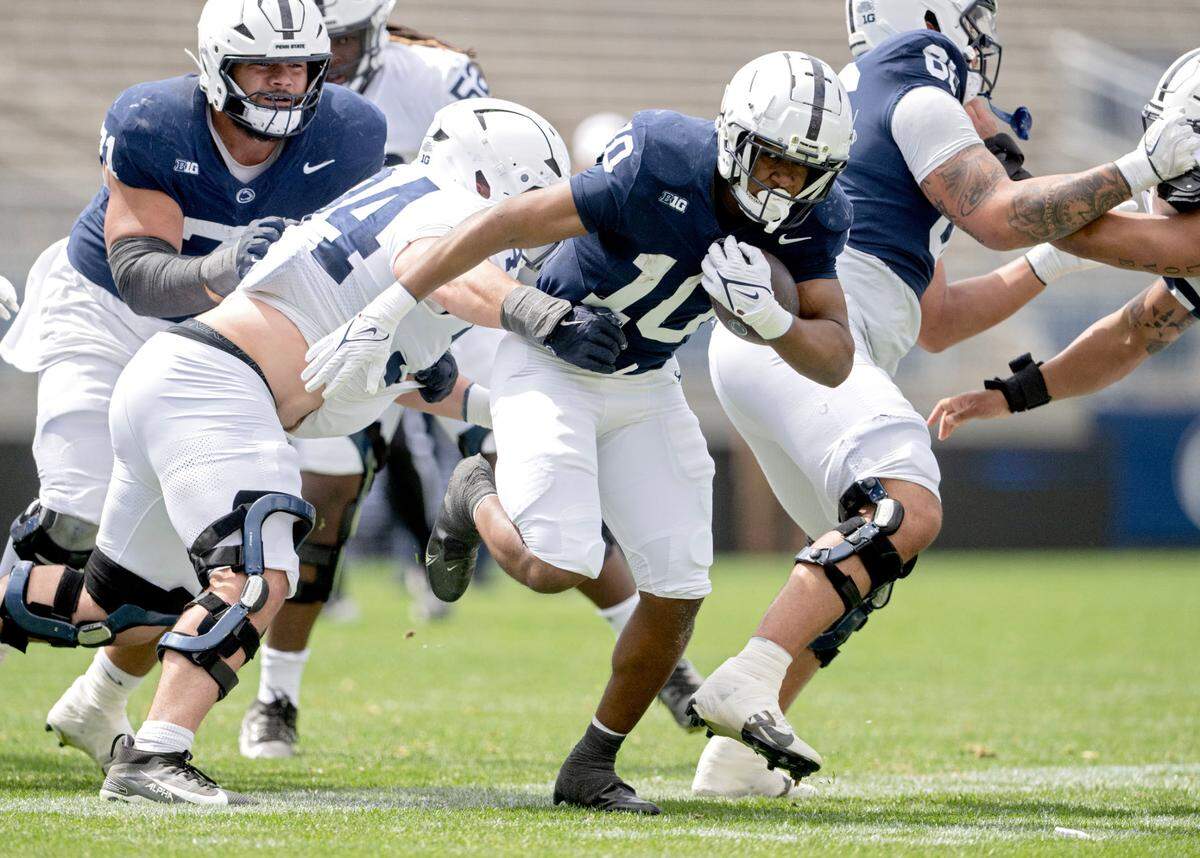 Penn State running back Nick Singleton cuts down the field with the ball during the Blue-White game on Saturday, April 26, 2025.