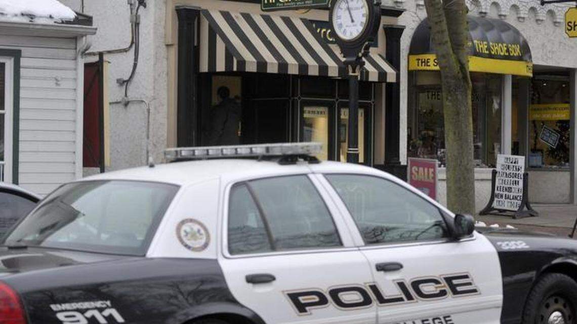 A State College police car is parked outside Kranich’s Jewelers after the downtown store was robbed Jan. 9, 2013.
