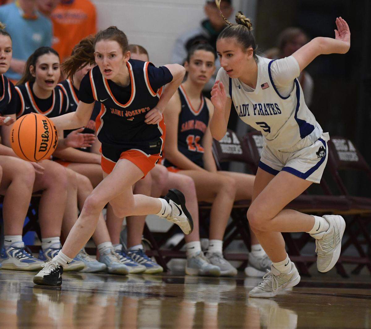 St. Joseph Academy's Alexia Luckovich advances the ball past Williamsburg's Brynn Lower during the PIAA Class A semifinal game Tuesday, March 17, 2026 at Altoona Area High School