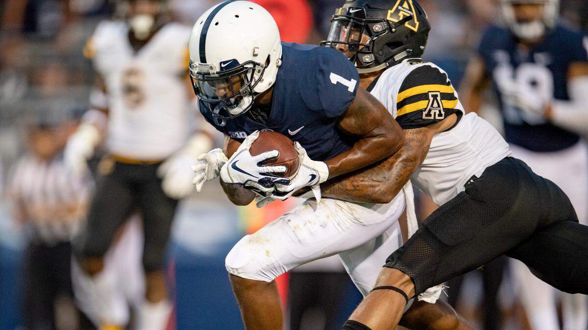 Penn State wide receiver KJ Hamler gets a touchdown ahead of an Appalachian State defender during the Saturday, Sept. 1, 2018 game at Beaver Stadium. 
