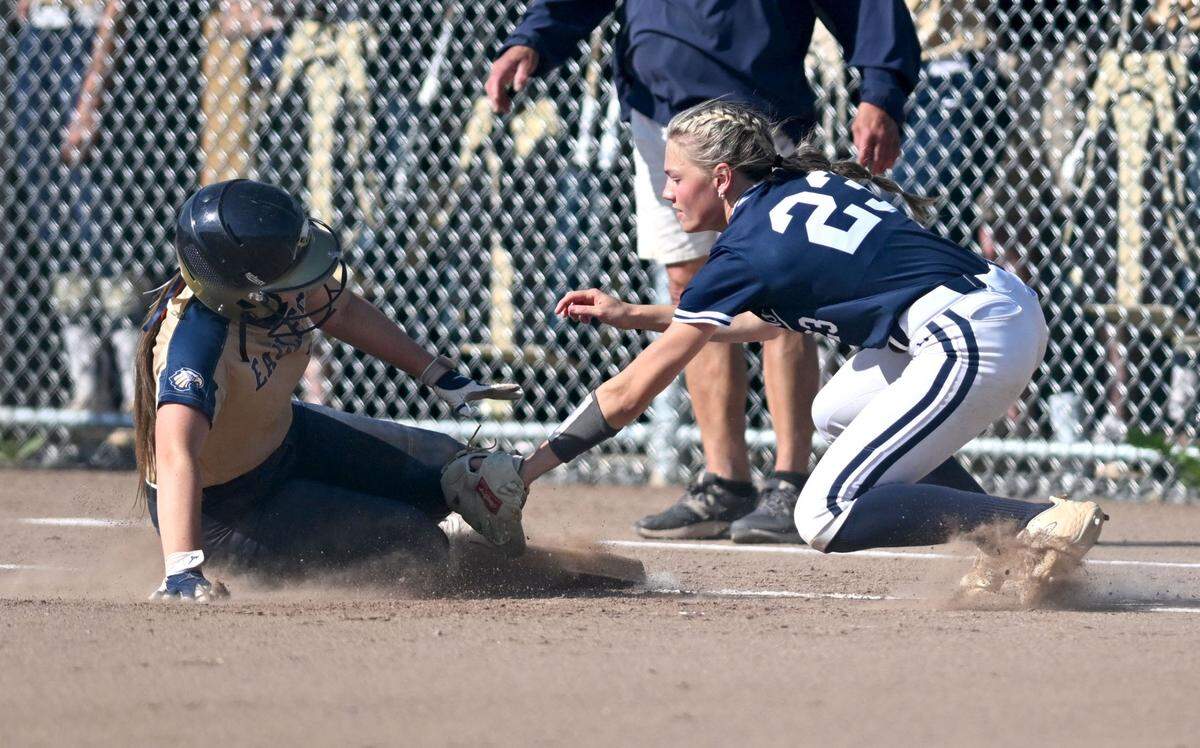 Bald Eagle Area’s Sydney Thompson safely steals third under the tag of Penns Valley’s Elle Dinges during the game on Friday, May 24, 2024.