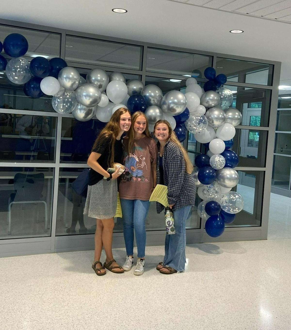 Pictured left to right, Ann-Marie McMurtrie, Ava VanAmburg and Abbey Mingear pose for a photo before classes start on Tuesday, Aug. 30, 2022.