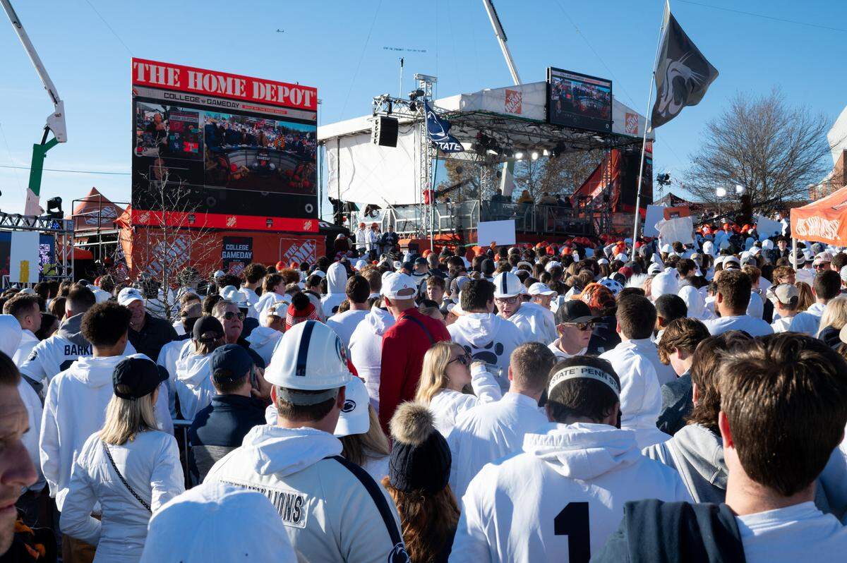 Fans gather around ESPN College GameDay on Saturday near Penn State’s Beaver Stadium, ahead of the PSU vs. Ohio State matchup.