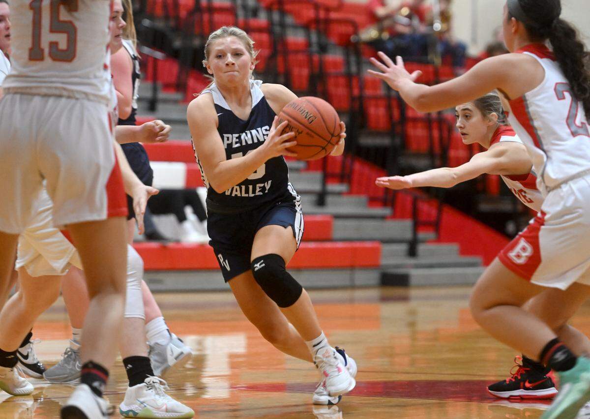 Bellefonte defenders can’t stop Penns Valley’s Avery Dinges as she goes in for a basket during the game on Monday, Jan. 23, 2023.