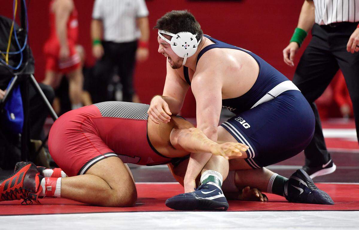 Penn State’s Seth Nevills reacts in pain as Rutgers Alex Esposito goes for the take down in first round of the Big Ten Wrestling championships at Rutgers on Saturday, March, 7, 2020.