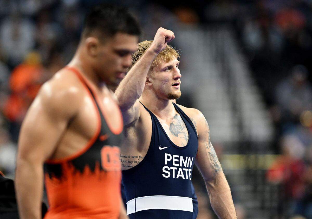 Penn State’s Josh Barr acknowledges Nittany Lion fans after he beat Oregon State’s Trey Munoz in a 197-pound bout during the 2025 NCAA Wrestling Championships in Philadelphia on Thursday, March 20, 2025.