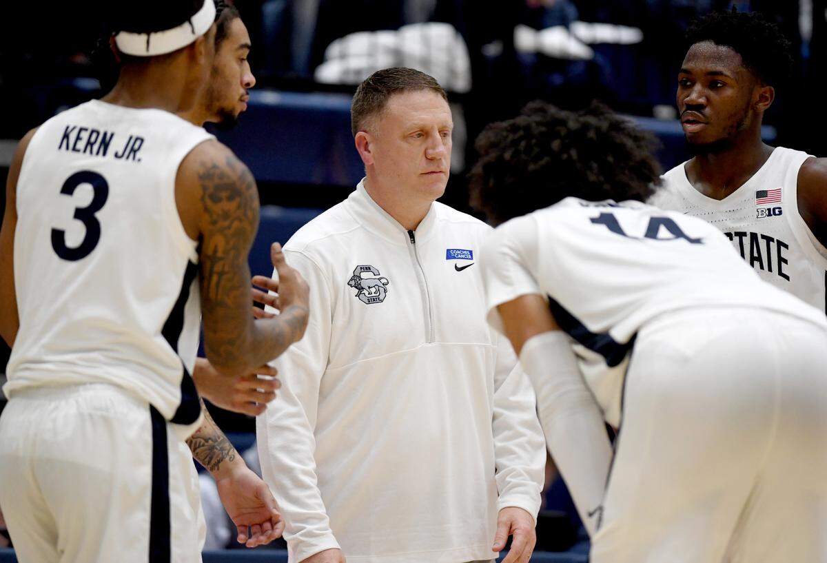 Penn State men’s basketball coach Mike Rhoades and his players stand in disappointment on a foul call during the game against Ohio State on Thursday, Jan. 30, 2025 at Rec Hall.