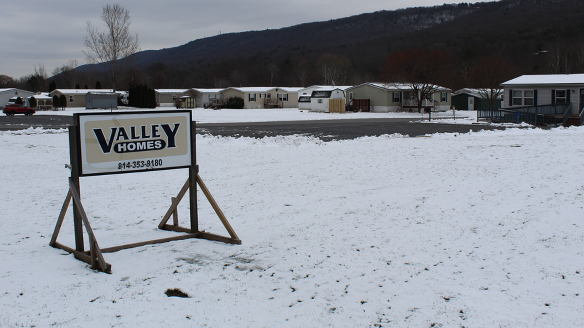 A Valley Homes sign is pictured outside of the Eagle Creek mobile home community.