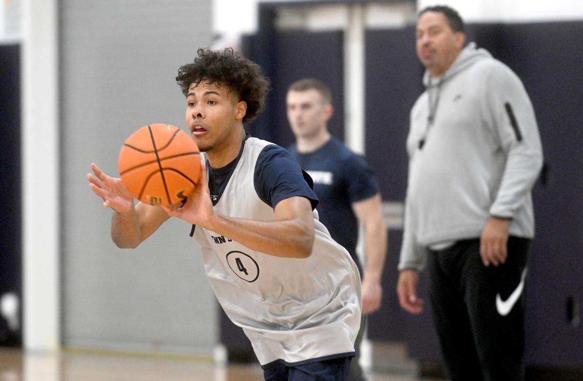 Penn State’s Puff Johnson runs a drill during a men’s basketball summer workout on Tuesday, July 11, 2023.