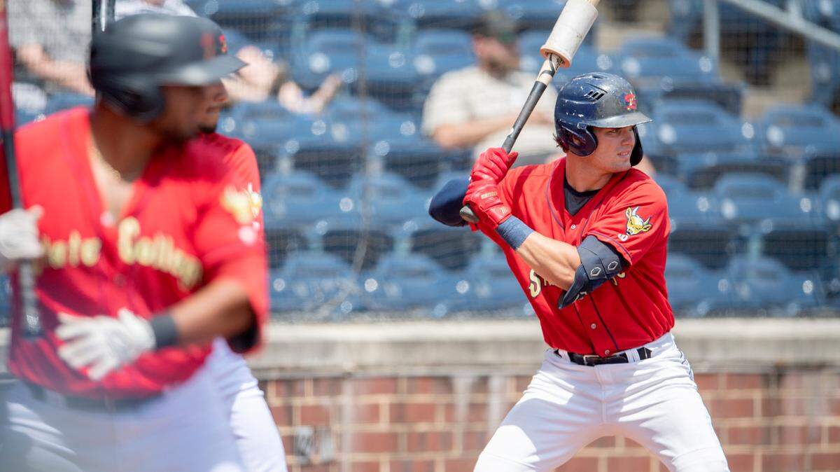 State College Spikes’ Kevin Karstetter and his teammates watch as Mahoning Valley’s pitcher warms up during the game on Wednesday, June 8, 2022.