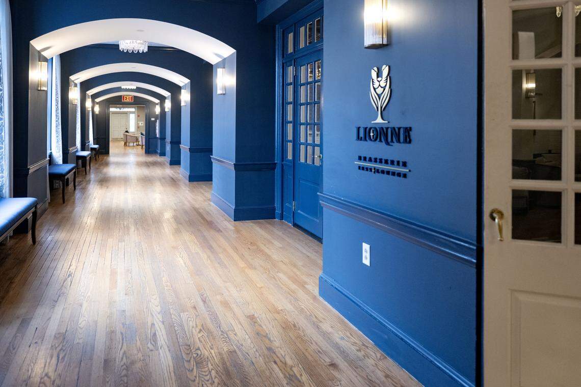 A hallway at the Nittany Lion Inn that features the original wood floors and woodwork. 