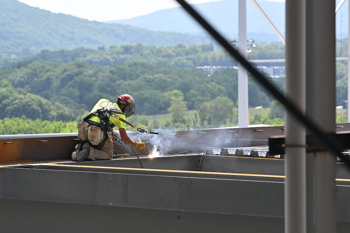Construction crews work at Beaver Stadium during July. This round of projects is expected to be complete by the start of the football season.