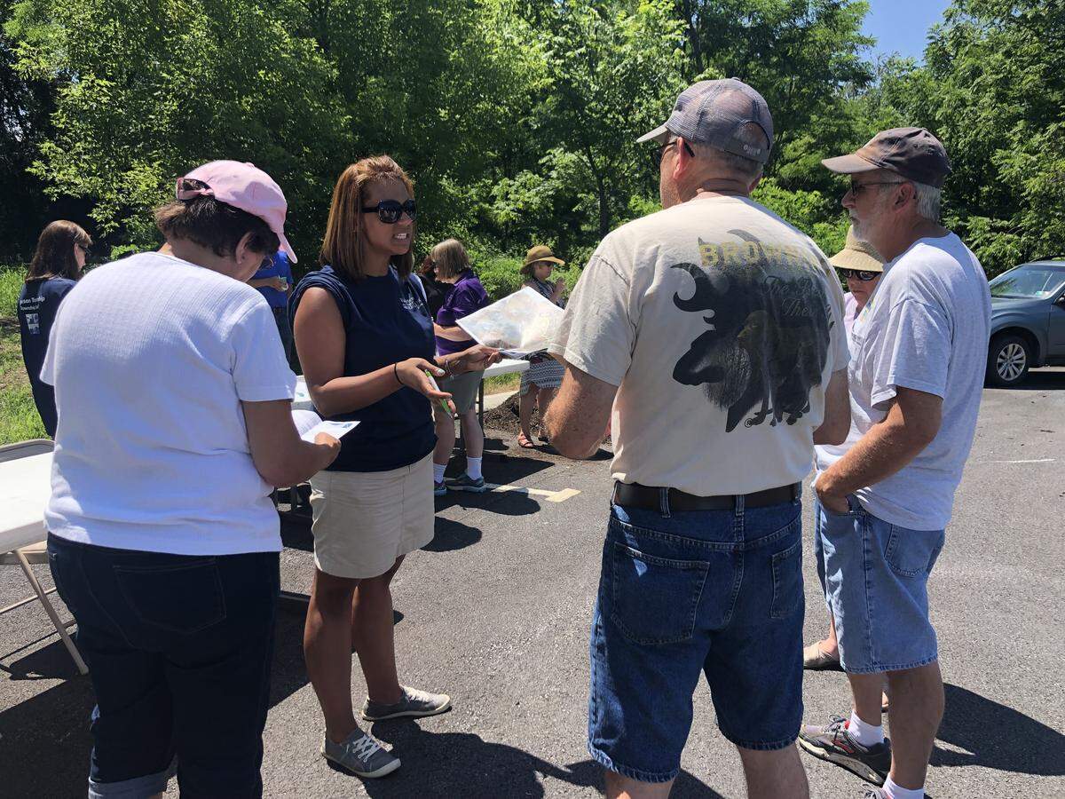 Ferguson Township Assistant Manager Centrice Martin explains how community members can share future ideas and potential concerns about Songbird Sanctuary with township staff during a community event at the site.