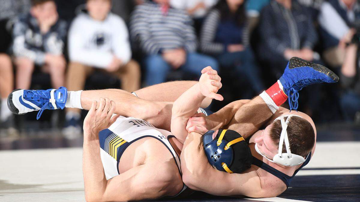 Penn State’s Jason Nolf, 157 lbs, pins Kent State’s  Joseph Andrassy Sunday at Rec Hall in State College. Penn State defeated Kent State, 52-3.