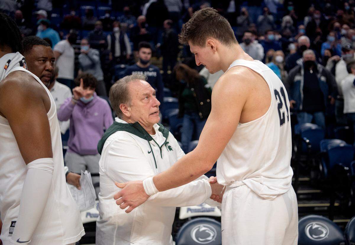 Michigan State men’s basketball coach Tom Izzo congratulates Penn State’s John Harrar after the Nittany Lion win on Tuesday, Feb. 15, 2022.