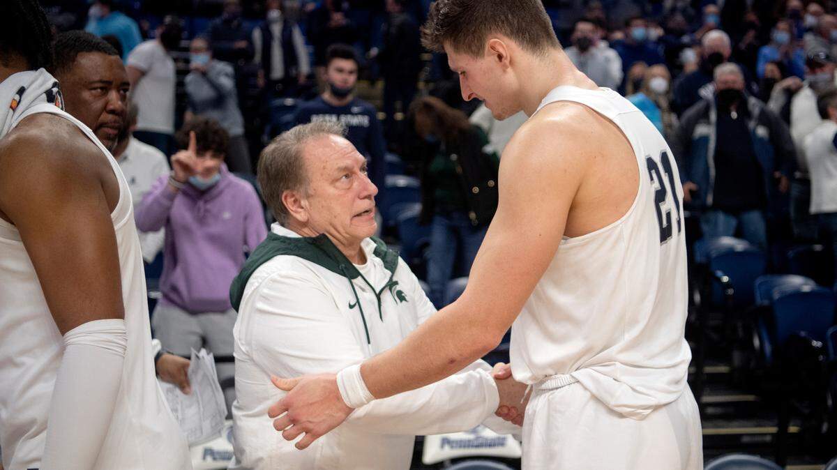 Michigan State men’s basketball coach Tom Izzo congratulates Penn State’s John Harrar after the Nittany Lion win on Tuesday, Feb. 15, 2022.