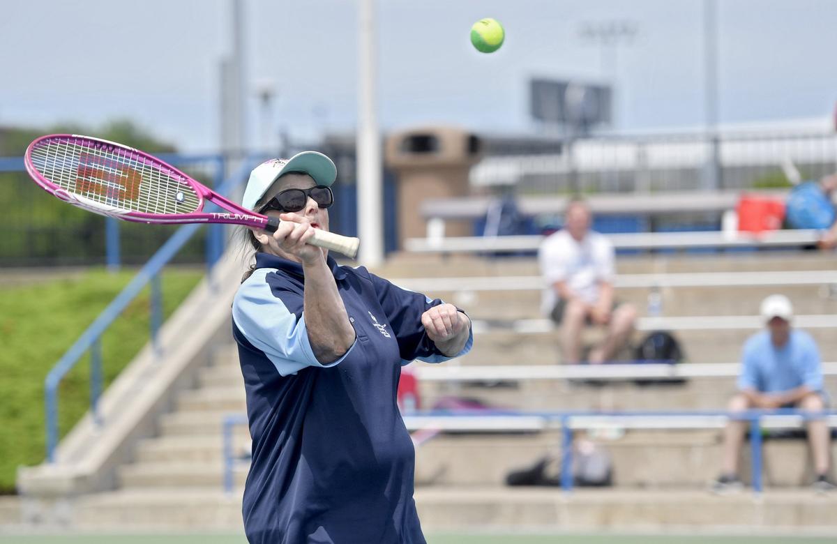 Centre County Special Olympics athlete Sarah Koston plays tennis at the Special Olympics Pennsylvania summer games on Friday, June 7, 2019.