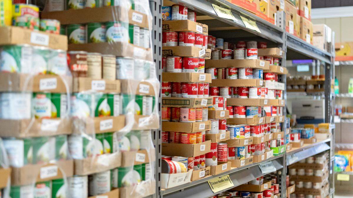 Canned goods are stacked on the shelves of the State College Food Bank on Thursday, May 26, 2022.