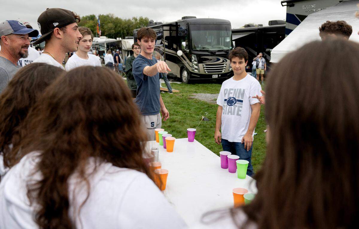 Penn State fans play pong in the tailgate lots outside of Beaver Stadium on Saturday, Sept. 28, 2024.