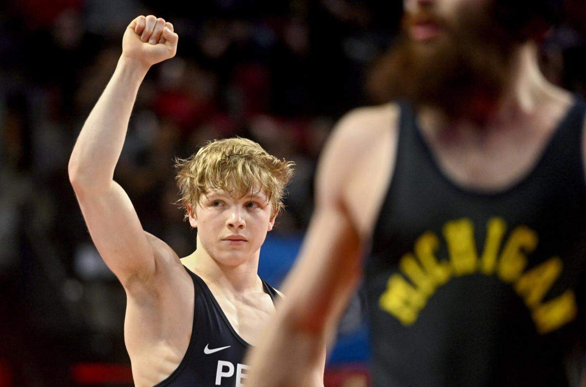 Penn State’s Braeden Davis celebrates his win over Michigan’s Michael DeAugustino in a 125 lb semifinal bout of the Big Ten Wresting Championships at the Xfinity Center at the University of Maryland on Saturday, March 9, 2024.