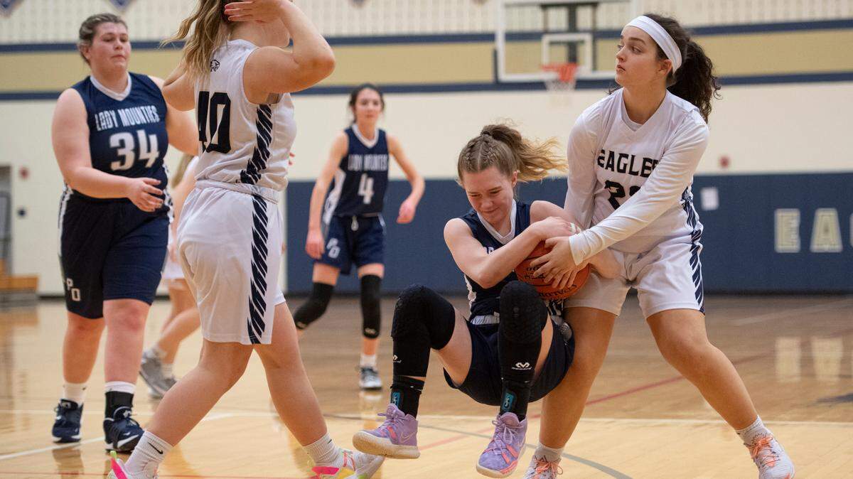 Bald Eagle’s Charlotte Cingle takes the ball away from Philipsburg-Osceola’s Maddy Malinich Thursday during a high school girls basketball game featuring Bald Eagle Area and Philipsburg-Osceola.