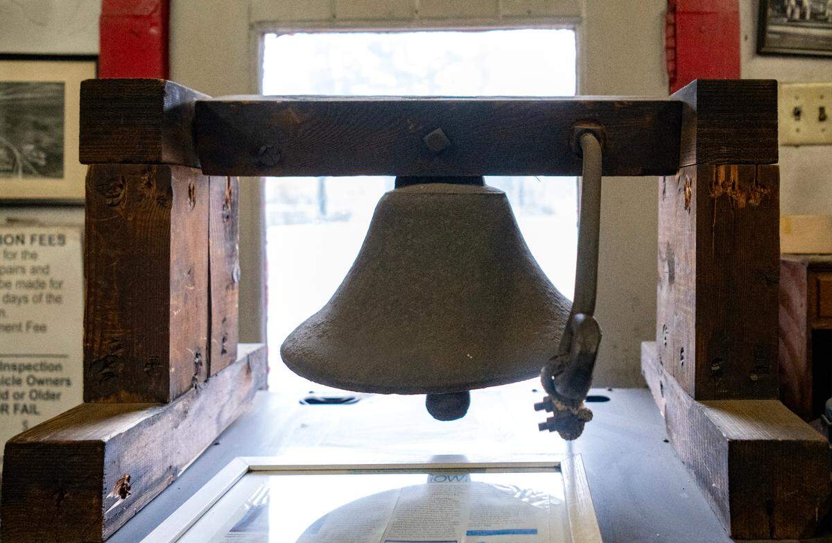 The bell from the Old College Heights School sits in the office of the College Heights Service Station, which is located across the street.
