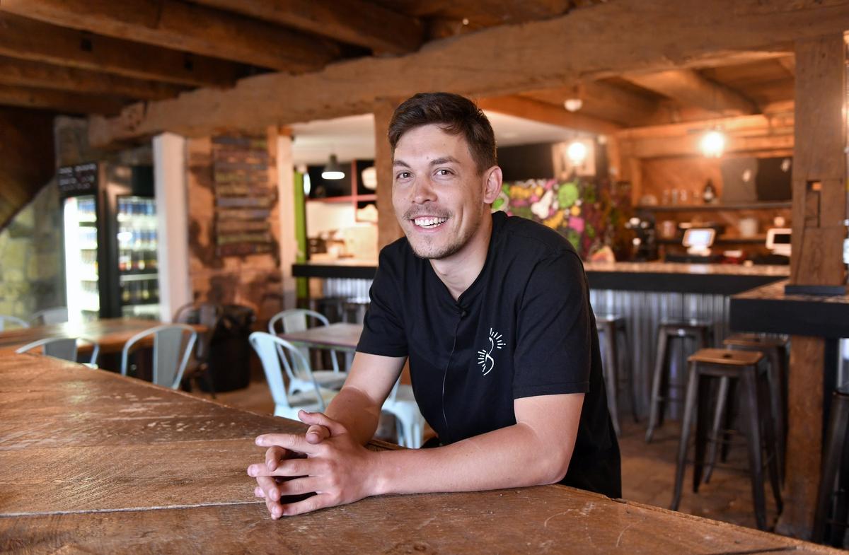 Eric Nartatez sits in the new Voodoo Brewery location in Lemont on Friday. The location will offer all Voodoo beers with 11 taps, bottles and cans.