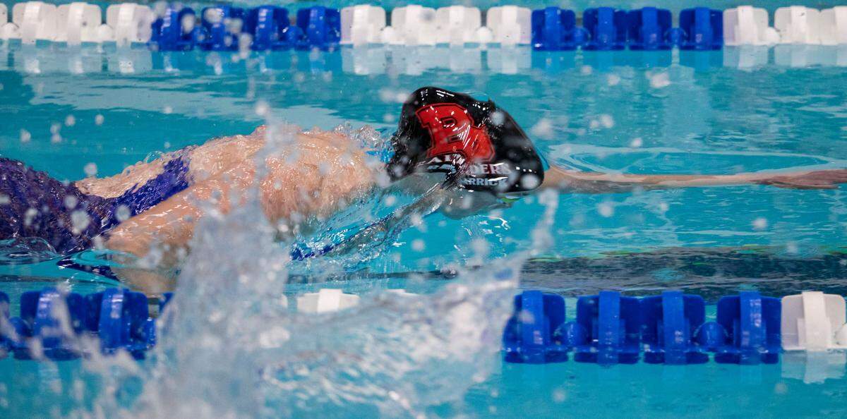 Bellefonte Area High School senior Kate Rarrick emerges from the water’s surface during the Girls 500 Yard Freestyle in the AA Bracket during the PIAA Swimming and Diving 2023 District 6 Championship held at the McCoy Natatorium on Saturday, March 4, 2023, in University Park, Pa. Rarrick placed second in her event with a final time of 5:15.70.