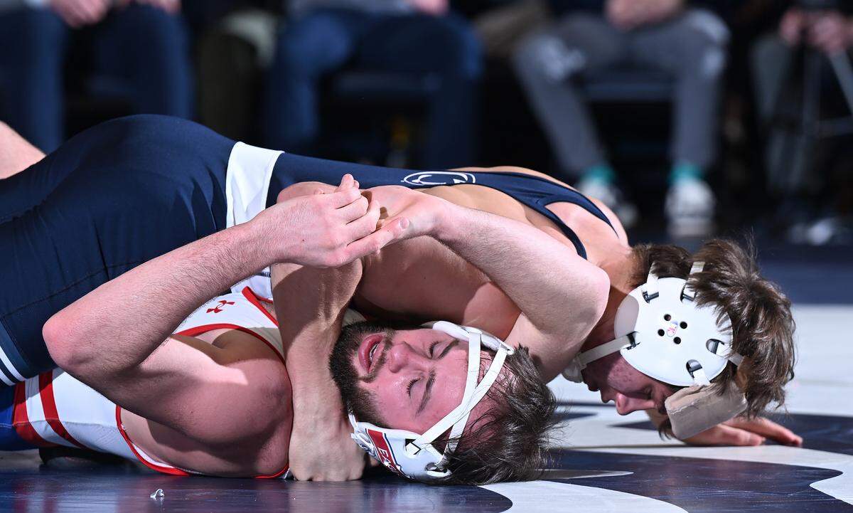 Penn State’s Tyler Kasak scores four near-fall points enroute to a pin-fall against American’s Jack Nies at 157 lbs. during the Friday, Feb. 21, 2025 match at Rec Hall in State College. Penn State defeated American University, 50-3.