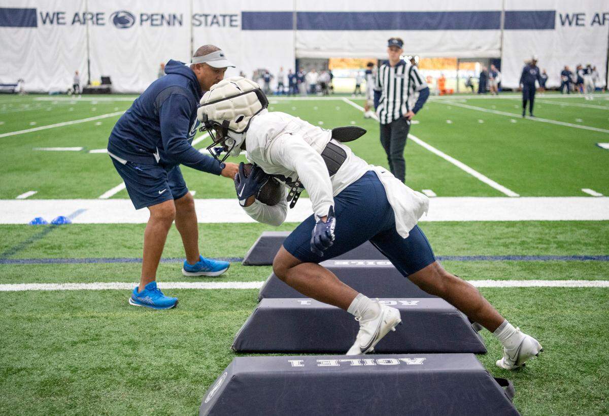 Penn State running back Kaytron Allen runs a drill during practice on Wednesday, Oct. 26, 2022.