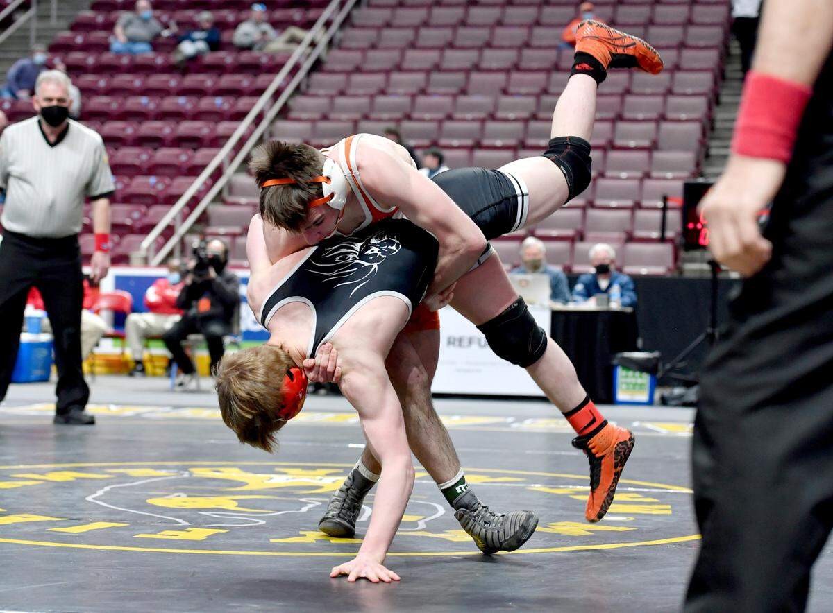 Saint Joseph’s Amonn Ohl controls Faith Christian’s Eric Alderfer in the 138 lb third place bout at the PIAA AA wrestling championships on Friday, March 12, 2021 at the Hershey Giant Center. Ohl won by decision, 2-0.