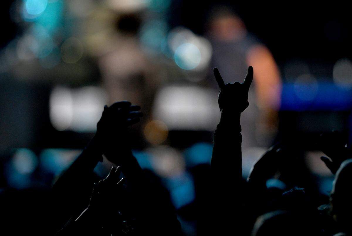 Fans applaud and rock out to Bruce Springsteen and the E Street Band at the Bryce Jordan Center on Saturday, March 18, 2023.