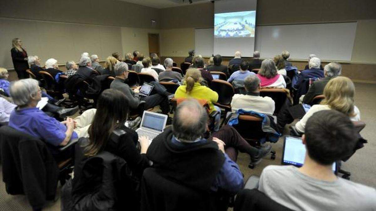 People watch the public comment period via video stream at the Penn State board of trustees meeting in January. The comment period was held before the meeting was called to order, in the room where the trustees were holding their executive session. The public was invited to watch on screen in another room, or via streaming through WPSU. That arrangement will continue at the trustees’ meeting next week in Hershey.
