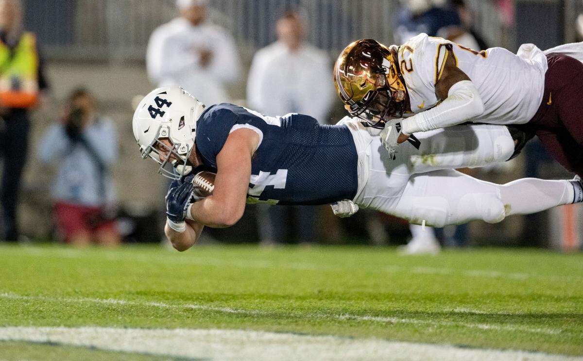 Minnesota’s Tyler Nubin can’t stop Penn State tight end Tyler Warren as he dives into the end zone for a touchdown during the game on Saturday, Oct. 22, 2022.
