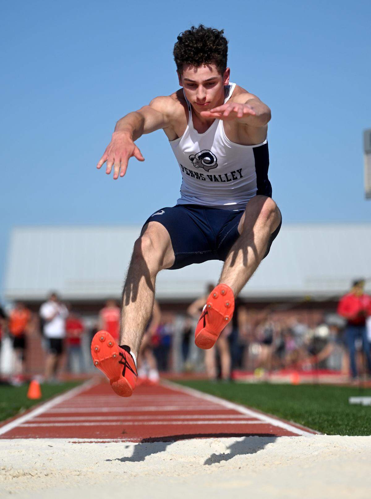 Penns Valley’s Miles Brooks competes in the triple jump during the Mountain League track and field championships on Tuesday, May 9, 2023.