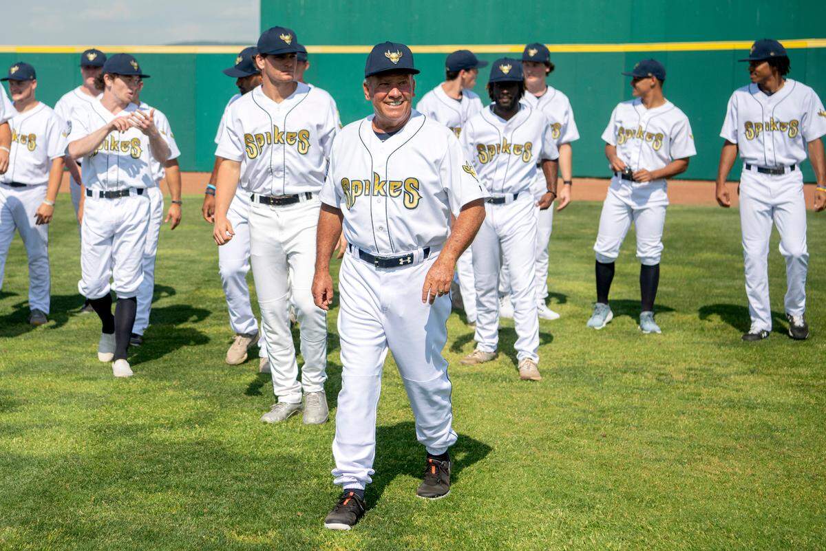 State College Spikes manager Dave Trembley on the field with players after the team photo on Tuesday, May 31, 2022.
