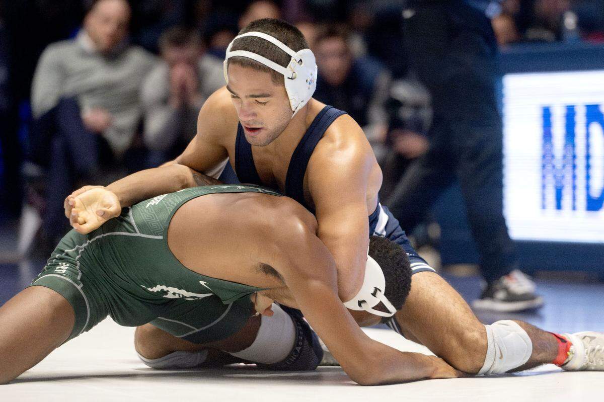 Penn State’s Shayne Van Ness controls Michigan State’s Clayton Jones in the 149 lb bout of the match on Friday, Jan. 10, 2025 in Rec Hall. Van Ness won by fall.