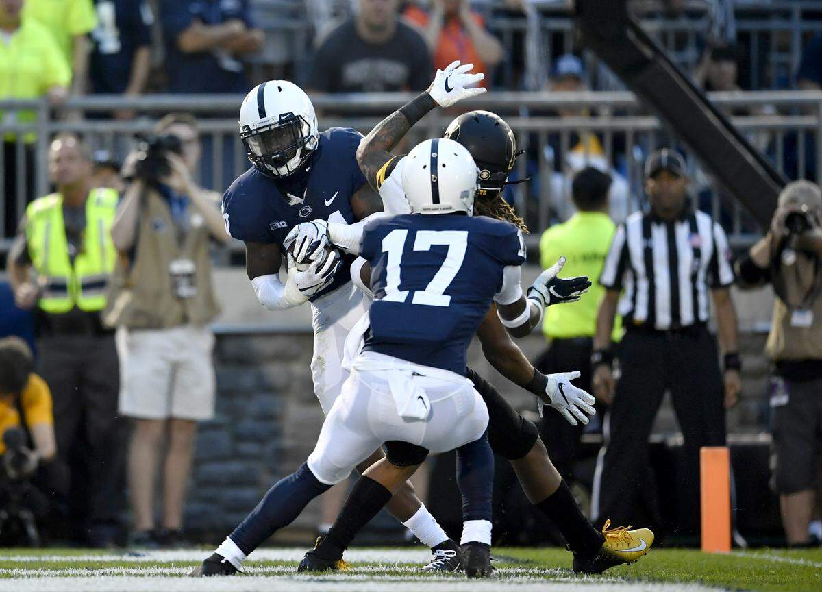 Penn State cornerback Amani Oruwariye intercepts the ball meant Appalachian State wide receiver Corey Sutton for the Nittany Lions to win in overtime of for the Saturday, Sept. 1, 2018 game at Beaver Stadium.
