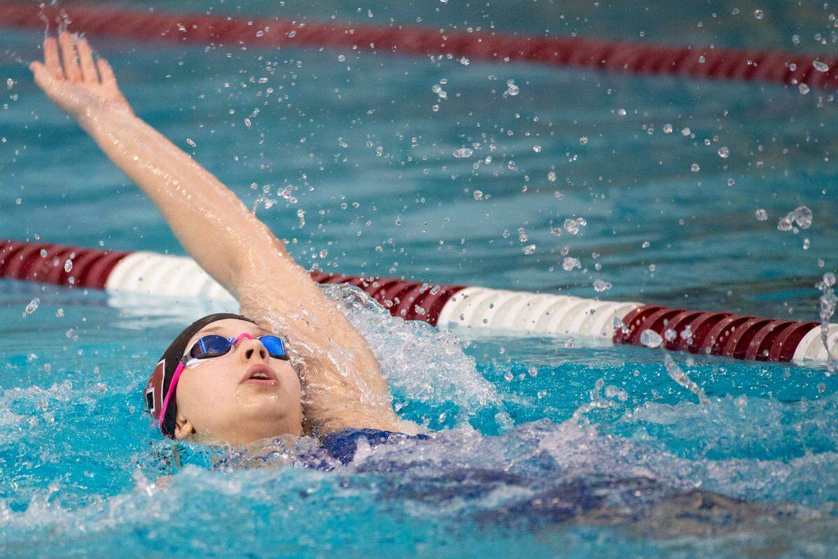 State College’s Maddy Koehle swims during the PIAA Swimming and Diving District VI AAA Championships at State College Area High School on Friday, March 5, 2021 in State College, PA.