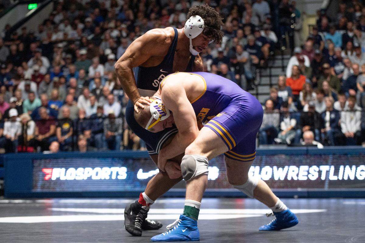 Carter Starocci, left, wrestles Parker Keckeisen, right, in a 184-pound bout during the NWCA All-Star Classic at Rec Hall on Saturday, Nov. 16, 2024. Starocci won the bout 4-1.