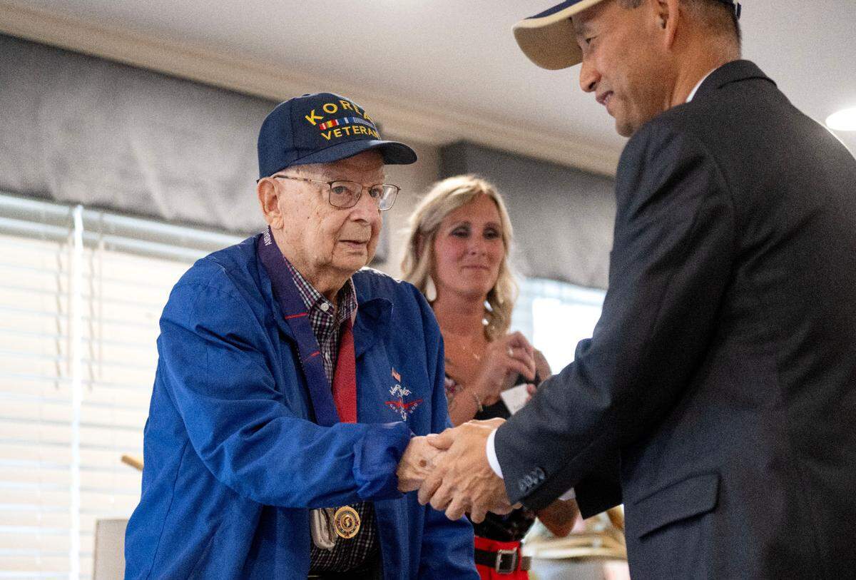 Richard “Dick” Singer is presented the Ambassador of Peace Medal by Ben Chon at Celebration Villa of Nittany Valley on Friday, July 18, 2025.
