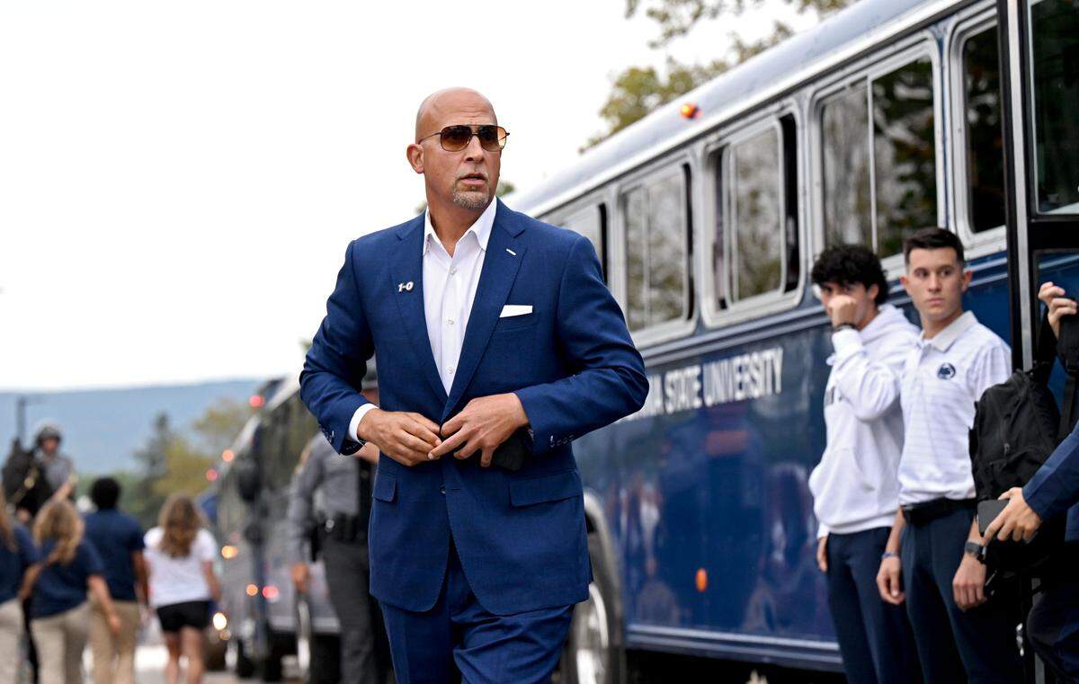 Penn State football coach James Franklin gets off the bus at Beaver Stadium for the game against Oregon on Saturday, Sept. 27, 2025.