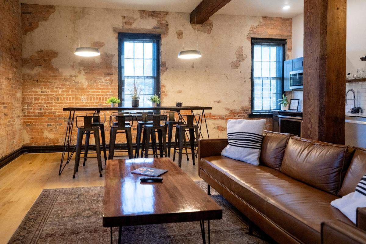 The living room area of the William Lamb Suite at the Gamble Mill on Thursday, Sept. 1, 2022.