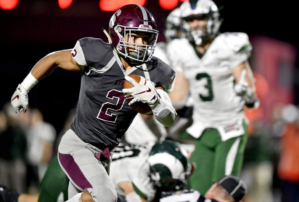 State College’s Dresyn Green runs down the field with the ball for a touchdown during the game against Central Dauphin on Friday, Oct. 11, 2019.