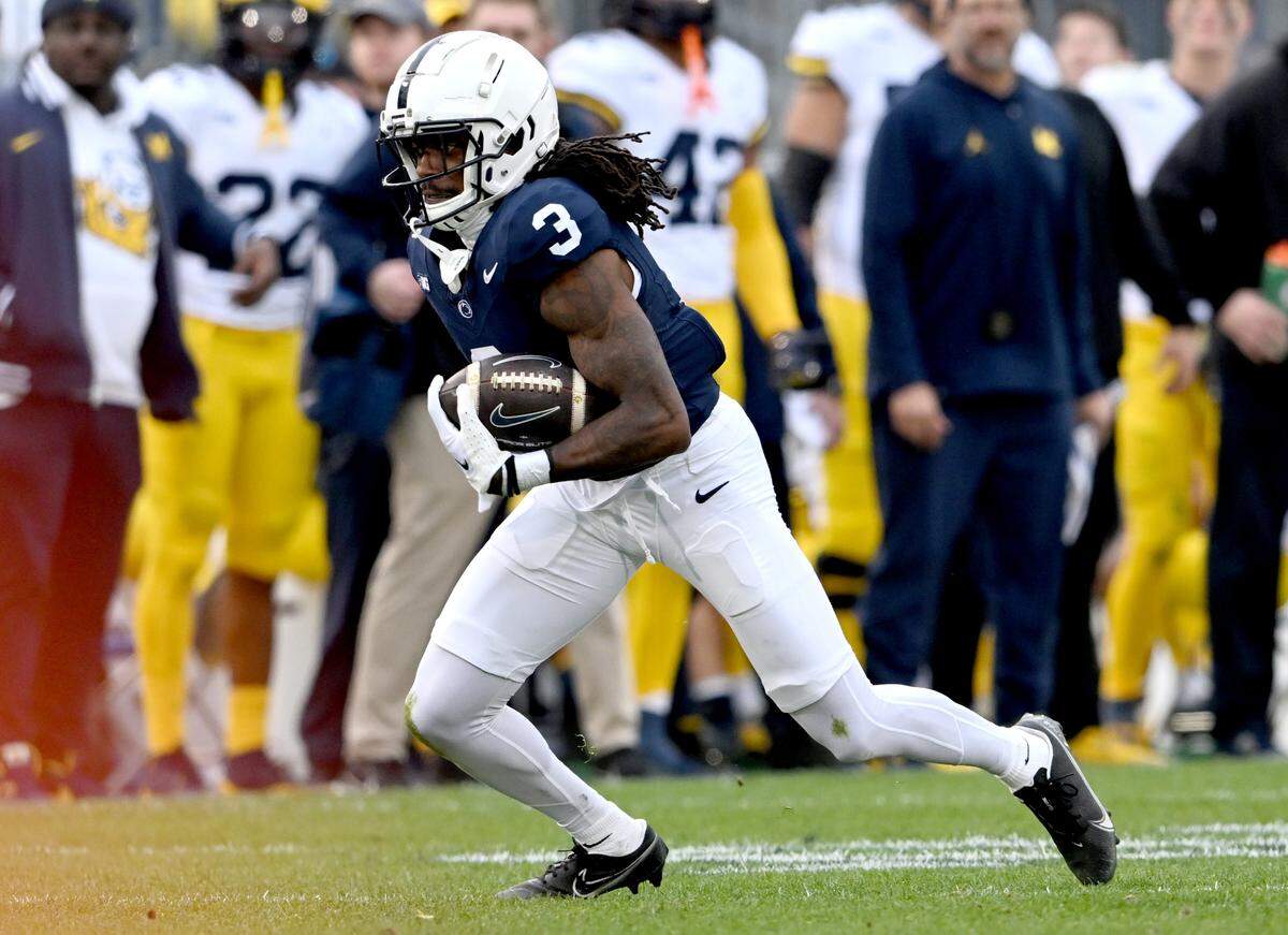 Penn State wide receiver Dante Cephas makes a catch and cuts down the field with the ball during the game against Michigan on Saturday, Nov. 11, 2023.