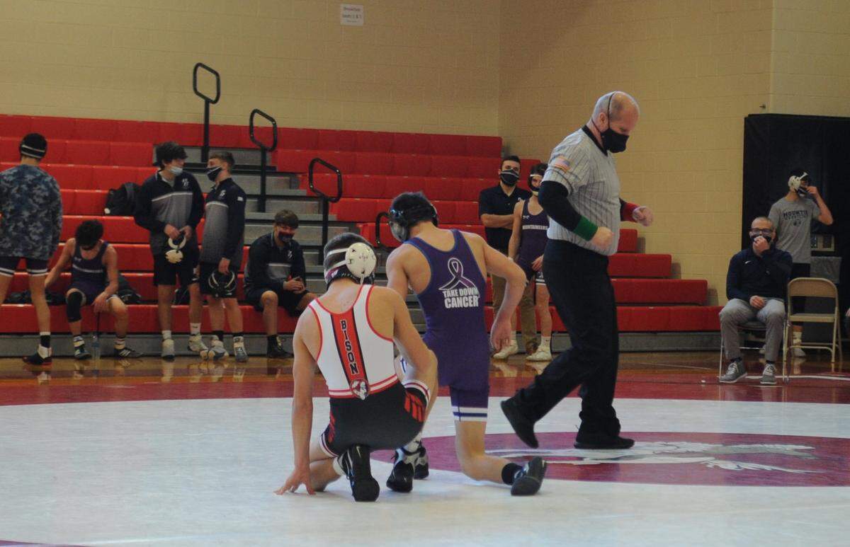 Philipsburg-Osceola wrestlers wore some purple singlets during their match with Clearfield on Saturday that said Take Down Cancer on the backs. The Mounties and Bison have had a tradition of raising funds for cancer research that culminates in the teams wrestling in dual.