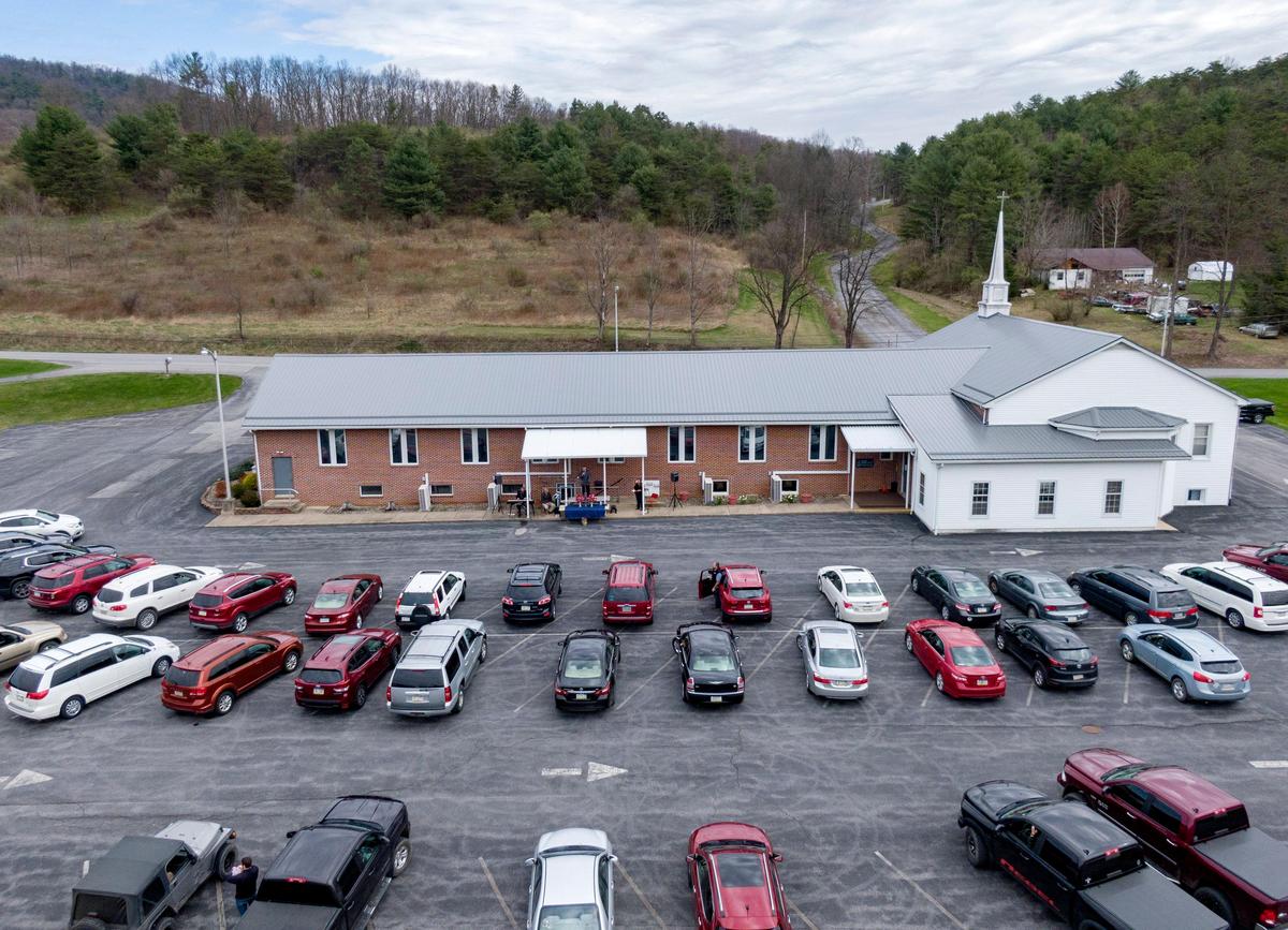 The congregation of Brookside Wesleyan Church gathered in vehicles in the church’s parking lot Sunday for a drive-in Easter service.